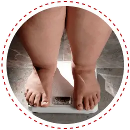 Person checking body weight on a scale